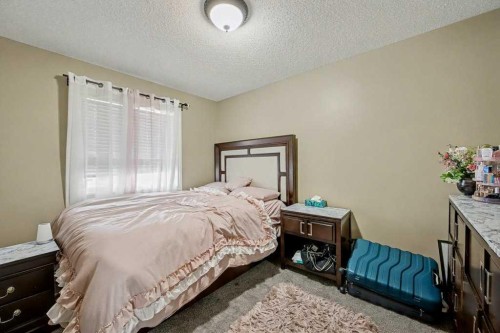 91 Panatella Close Nw, Calgary, AB - Indoor Photo Showing Bedroom