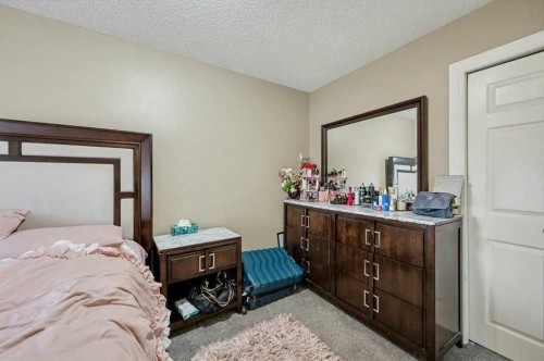 91 Panatella Close Nw, Calgary, AB - Indoor Photo Showing Bedroom