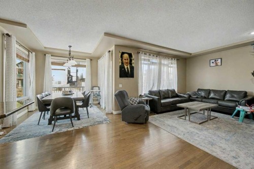 91 Panatella Close Nw, Calgary, AB - Indoor Photo Showing Living Room