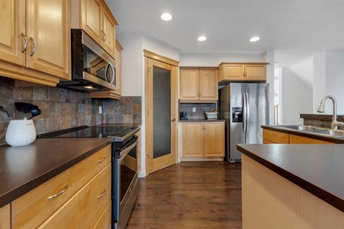 29 Sunset Close, Cochrane, AB - Indoor Photo Showing Kitchen With Double Sink