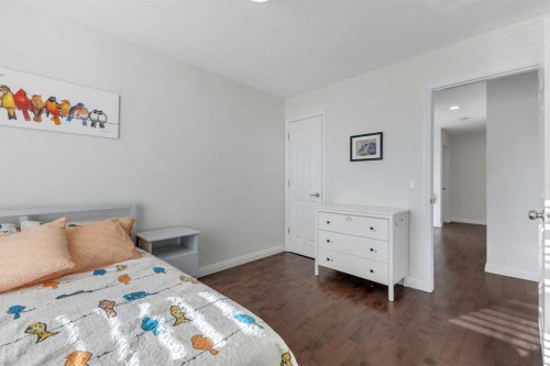 29 Sunset Close, Cochrane, AB - Indoor Photo Showing Bedroom