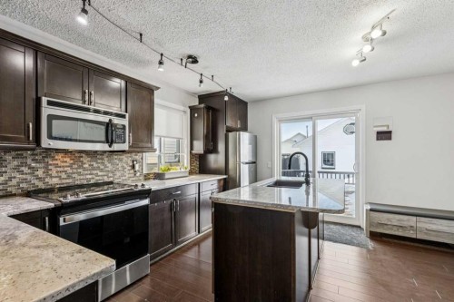 22 Hunterhorn Crescent Ne, Calgary, AB - Indoor Photo Showing Kitchen With Stainless Steel Kitchen With Upgraded Kitchen