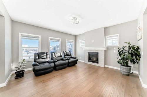 201 Aspenmere Way, Chestermere, AB - Indoor Photo Showing Living Room With Fireplace