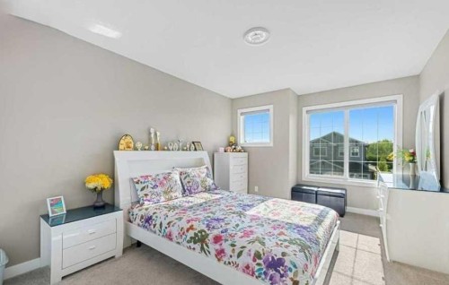 201 Aspenmere Way, Chestermere, AB - Indoor Photo Showing Bedroom