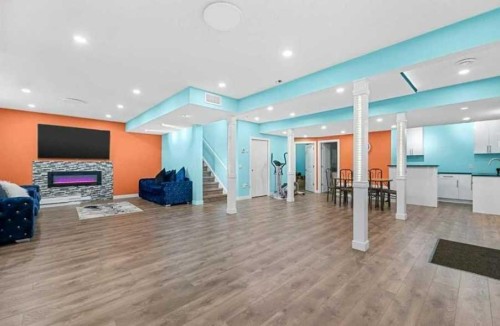 201 Aspenmere Way, Chestermere, AB - Indoor With Fireplace