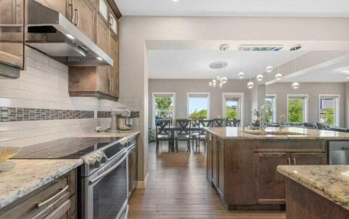 201 Aspenmere Way, Chestermere, AB - Indoor Photo Showing Kitchen With Upgraded Kitchen