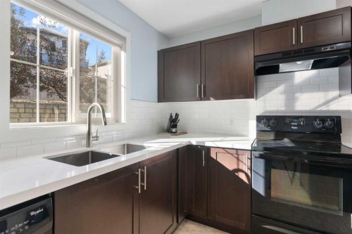 90 Pantego Lane Nw, Calgary, AB - Indoor Photo Showing Kitchen With Double Sink With Upgraded Kitchen