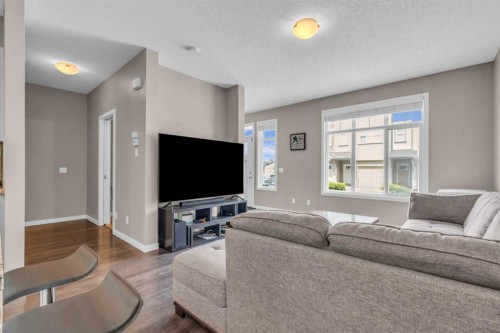93 Copperstone Common Se, Calgary, AB - Indoor Photo Showing Living Room