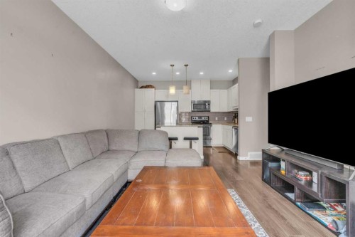 93 Copperstone Common Se, Calgary, AB - Indoor Photo Showing Living Room