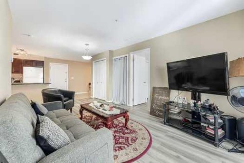 215-355 Taralake Way Ne, Calgary, AB - Indoor Photo Showing Living Room