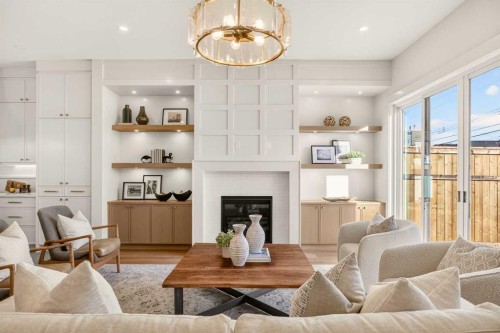 2535 2 Avenue Nw, Calgary, AB - Indoor Photo Showing Living Room With Fireplace