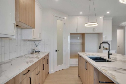569 Muirfield Crescent, Lyalta, AB - Indoor Photo Showing Kitchen With Double Sink With Upgraded Kitchen