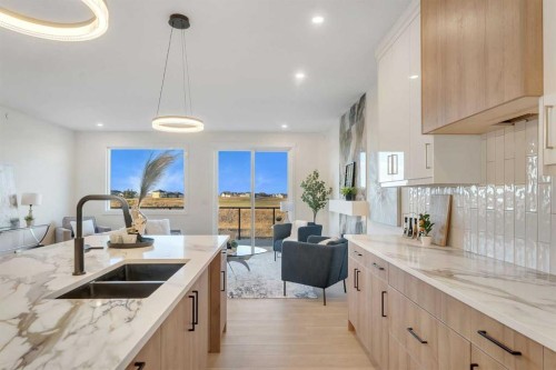 569 Muirfield Crescent, Lyalta, AB - Indoor Photo Showing Kitchen With Double Sink With Upgraded Kitchen