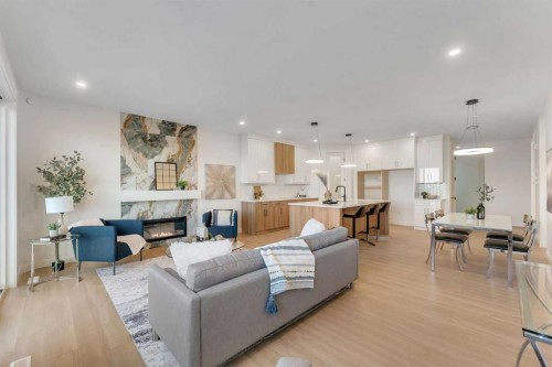 569 Muirfield Crescent, Lyalta, AB - Indoor Photo Showing Living Room With Fireplace