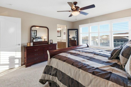 54 Crestbrook Drive Sw, Calgary, AB - Indoor Photo Showing Bedroom