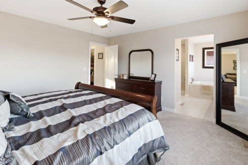 54 Crestbrook Drive Sw, Calgary, AB - Indoor Photo Showing Bedroom