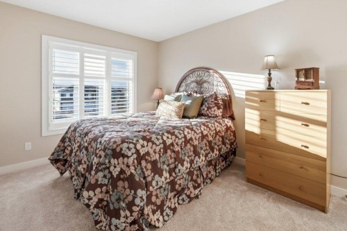 54 Crestbrook Drive Sw, Calgary, AB - Indoor Photo Showing Bedroom