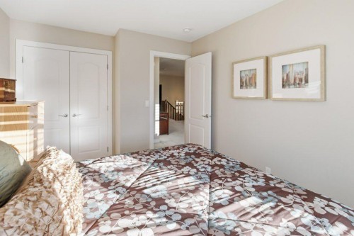 54 Crestbrook Drive Sw, Calgary, AB - Indoor Photo Showing Bedroom