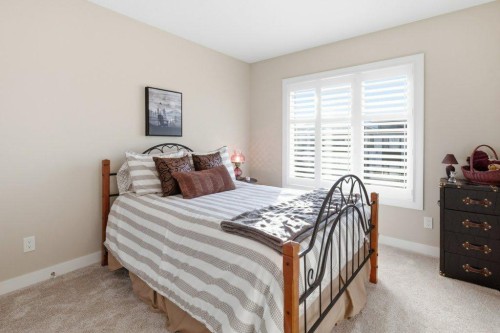 54 Crestbrook Drive Sw, Calgary, AB - Indoor Photo Showing Bedroom