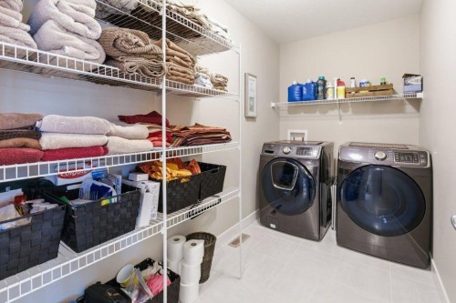 54 Crestbrook Drive Sw, Calgary, AB - Indoor Photo Showing Laundry Room