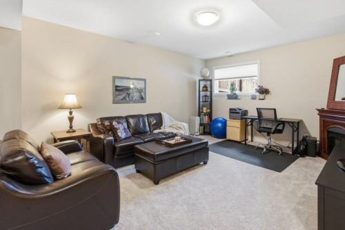 54 Crestbrook Drive Sw, Calgary, AB - Indoor Photo Showing Living Room