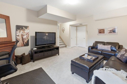 54 Crestbrook Drive Sw, Calgary, AB - Indoor Photo Showing Living Room