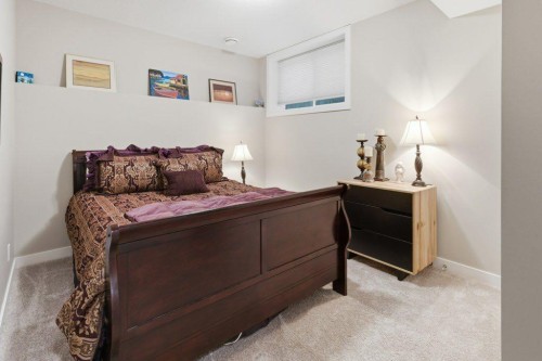 54 Crestbrook Drive Sw, Calgary, AB - Indoor Photo Showing Bedroom