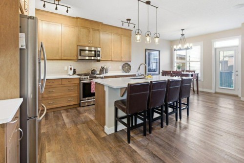 54 Crestbrook Drive Sw, Calgary, AB - Indoor Photo Showing Kitchen With Upgraded Kitchen