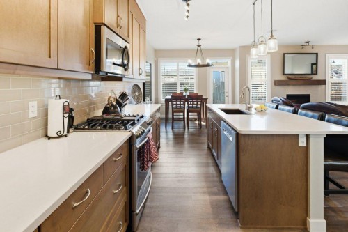 54 Crestbrook Drive Sw, Calgary, AB - Indoor Photo Showing Kitchen With Double Sink With Upgraded Kitchen