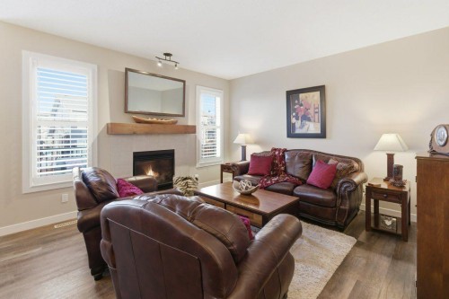 54 Crestbrook Drive Sw, Calgary, AB - Indoor Photo Showing Living Room With Fireplace