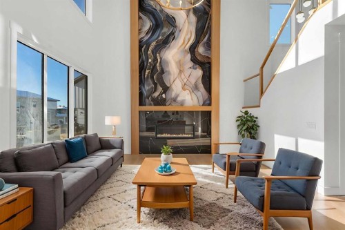 268 South Shore View, Chestermere, AB - Indoor Photo Showing Living Room With Fireplace