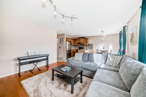 238 Bridleridge Way Sw, Calgary, AB - Indoor Photo Showing Living Room