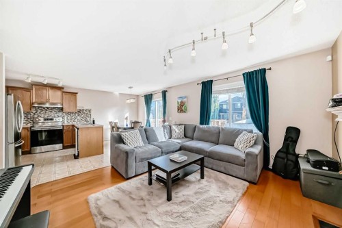 238 Bridleridge Way Sw, Calgary, AB - Indoor Photo Showing Living Room