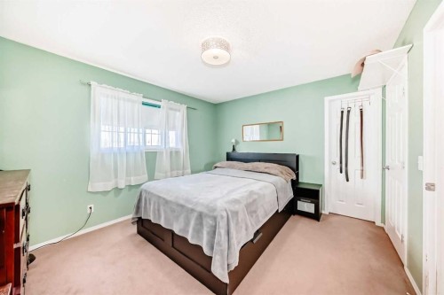 238 Bridleridge Way Sw, Calgary, AB - Indoor Photo Showing Bedroom