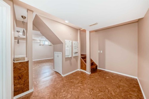 238 Bridleridge Way Sw, Calgary, AB - Indoor Photo Showing Other Room