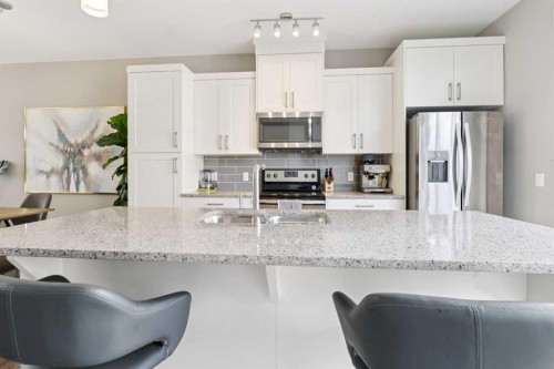 645 Evanston Manor Nw, Calgary, AB - Indoor Photo Showing Kitchen With Stainless Steel Kitchen With Upgraded Kitchen
