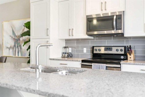 645 Evanston Manor Nw, Calgary, AB - Indoor Photo Showing Kitchen With Stainless Steel Kitchen With Upgraded Kitchen