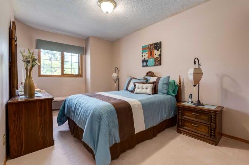 180 Edgevalley Circle Nw, Calgary, AB - Indoor Photo Showing Bedroom