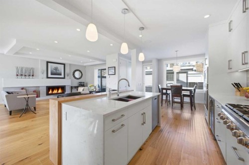 932 5 Avenue Ne, Calgary, AB - Indoor Photo Showing Kitchen With Double Sink With Upgraded Kitchen