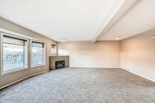 677 Regal Park Ne, Calgary, AB - Indoor With Fireplace
