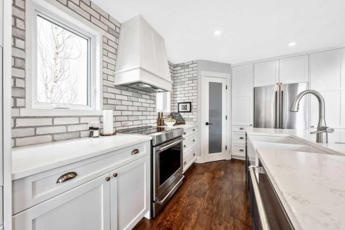95 Cranleigh Gardens Se, Calgary, AB - Indoor Photo Showing Kitchen With Stainless Steel Kitchen With Upgraded Kitchen