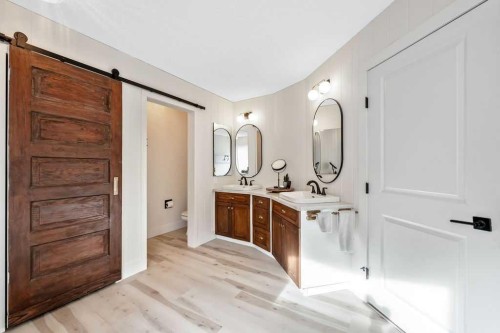 95 Cranleigh Gardens Se, Calgary, AB - Indoor Photo Showing Laundry Room