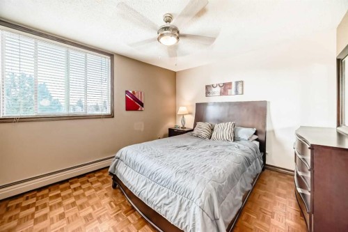 201-512 Cedar Crescent Sw, Calgary, AB - Indoor Photo Showing Bedroom