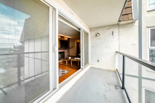 201-512 Cedar Crescent Sw, Calgary, AB - Outdoor With Balcony With Exterior