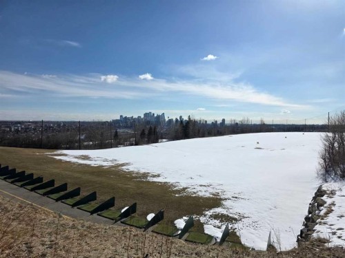 201-512 Cedar Crescent Sw, Calgary, AB - Outdoor With Body Of Water With View