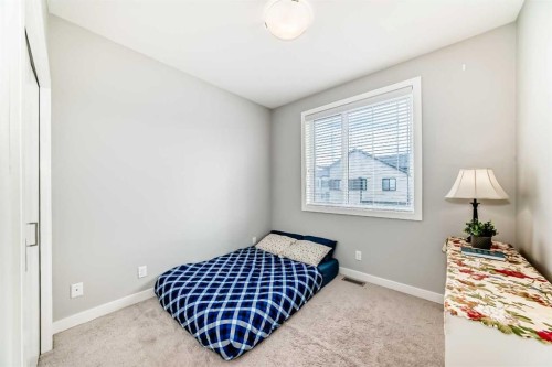 111 Redstone Crescent Ne, Calgary, AB - Indoor Photo Showing Bedroom