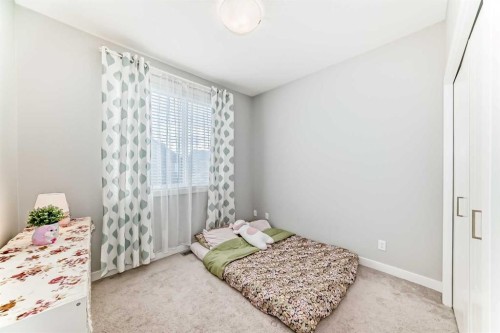 111 Redstone Crescent Ne, Calgary, AB - Indoor Photo Showing Bedroom