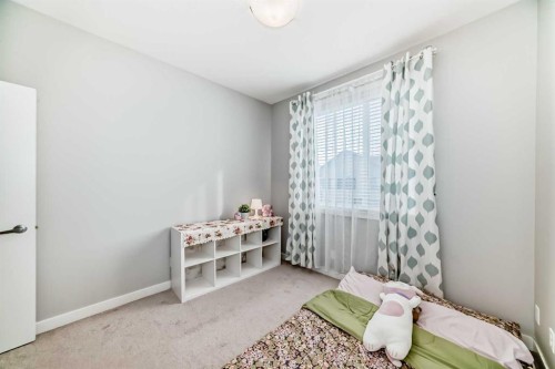 111 Redstone Crescent Ne, Calgary, AB - Indoor Photo Showing Bedroom