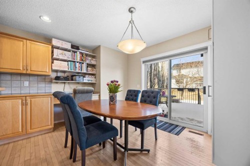83 Cougarstone Way Sw, Calgary, AB - Indoor Photo Showing Dining Room