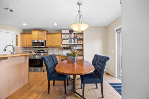 83 Cougarstone Way Sw, Calgary, AB - Indoor Photo Showing Dining Room